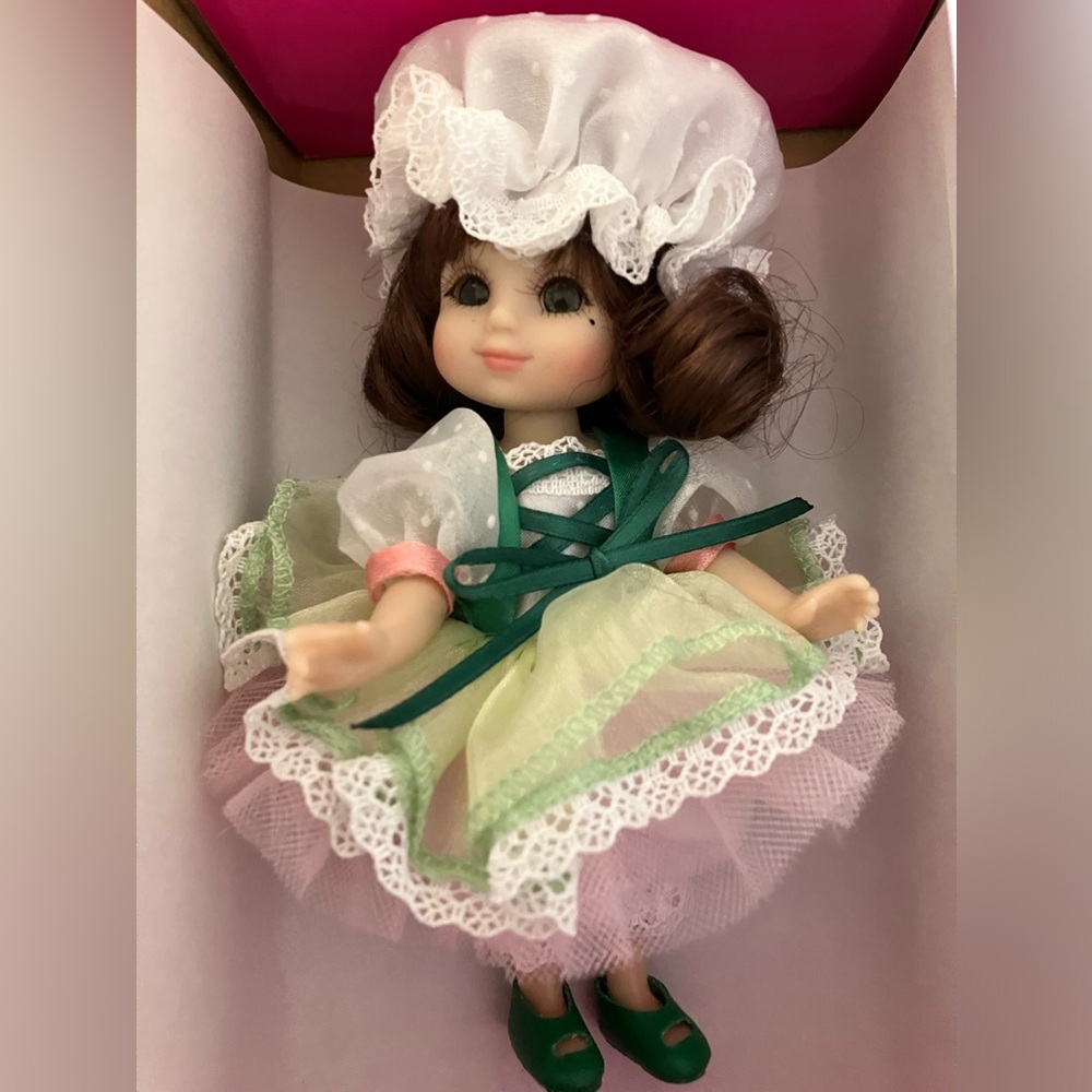 Gently used in original box Marie Osmond March Calendar Girl Doll 6 inch